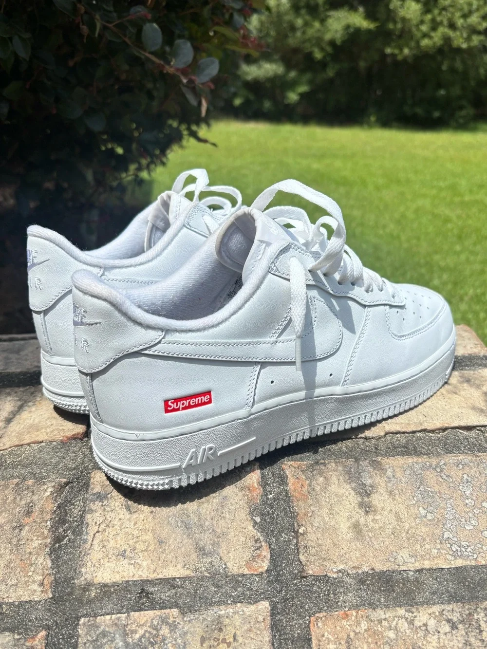 Nike White Low-Top Leather Sneaker with Red Supreme Box Logo